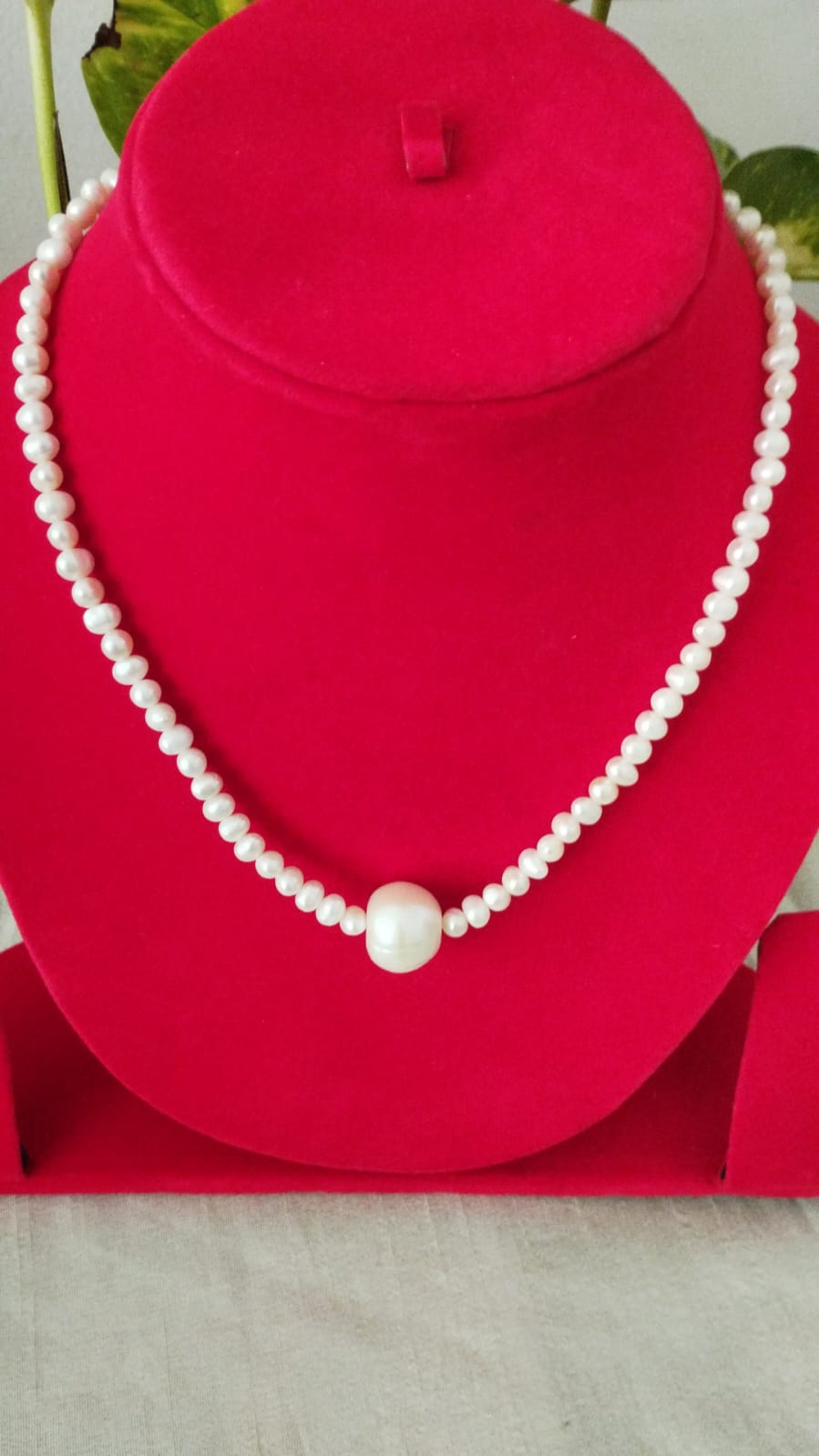 Fresh Water Pearls Necklace with Two Sized Pearls - 5 mm and Single 12 mm in Center