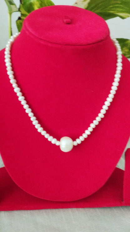 Fresh Water Pearls Necklace with Two Sized Pearls - 5 mm and Single 12 mm in Center