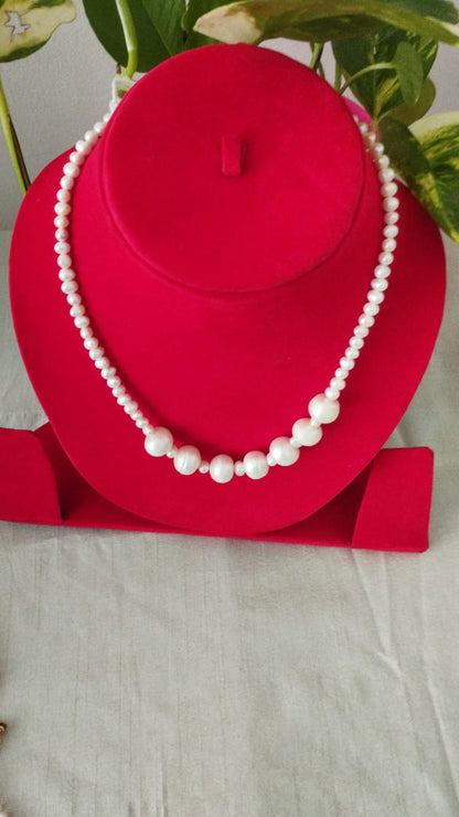 Fresh Water Pearls Necklace 5 mm with Seven 12 mm White Pearls in Center